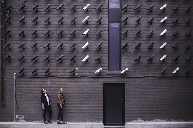 Multiple security cameras installed on commercial building exterior in Montreal